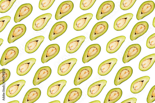 Avocado with leaves on a gray background