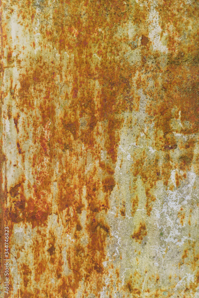Multicolored background: rusty metal surface with flaking and cracking texture. Multicolored background: rusty metal surface with flaking and cracking texture.