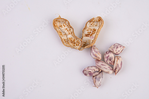 Delicious shelled peanuts used as food And can eat snacks isolated on white background.