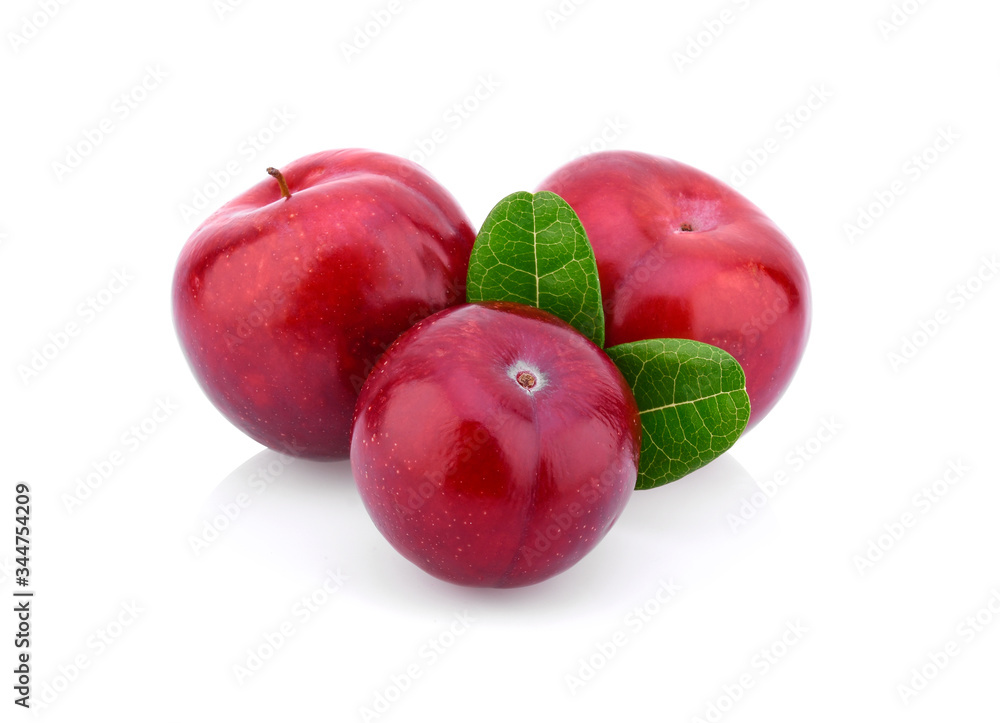 Obraz premium red cherry plum with leaf isolated on white background