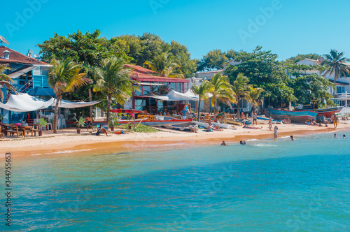 Buzios, Brazil - february 24, 2018: Streets of Buzios are filled with shops and restaurants are popular for tourists to visit at night time.