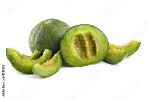 Melon, half and slices isolated on white