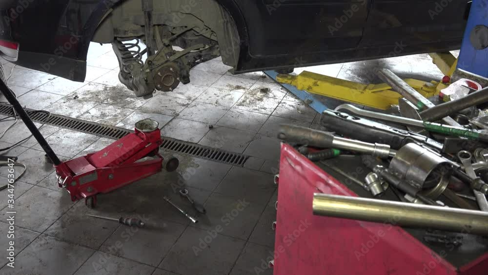 car repair at auto service station. 4K car repair at auto service station. 4K