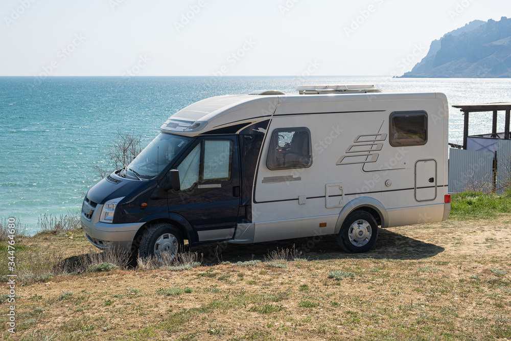 A house on wheels. The motorhome. Camping. Outdoors. A wild kind of getaway. Rv.