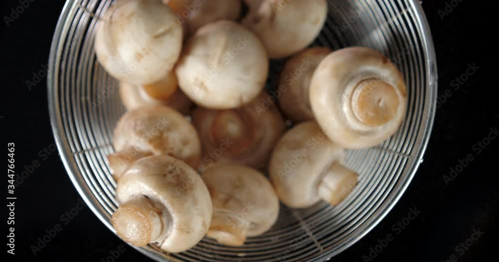 Fresh fragrant mushrooms in a colander. Fresh fragrant mushrooms in a colander.