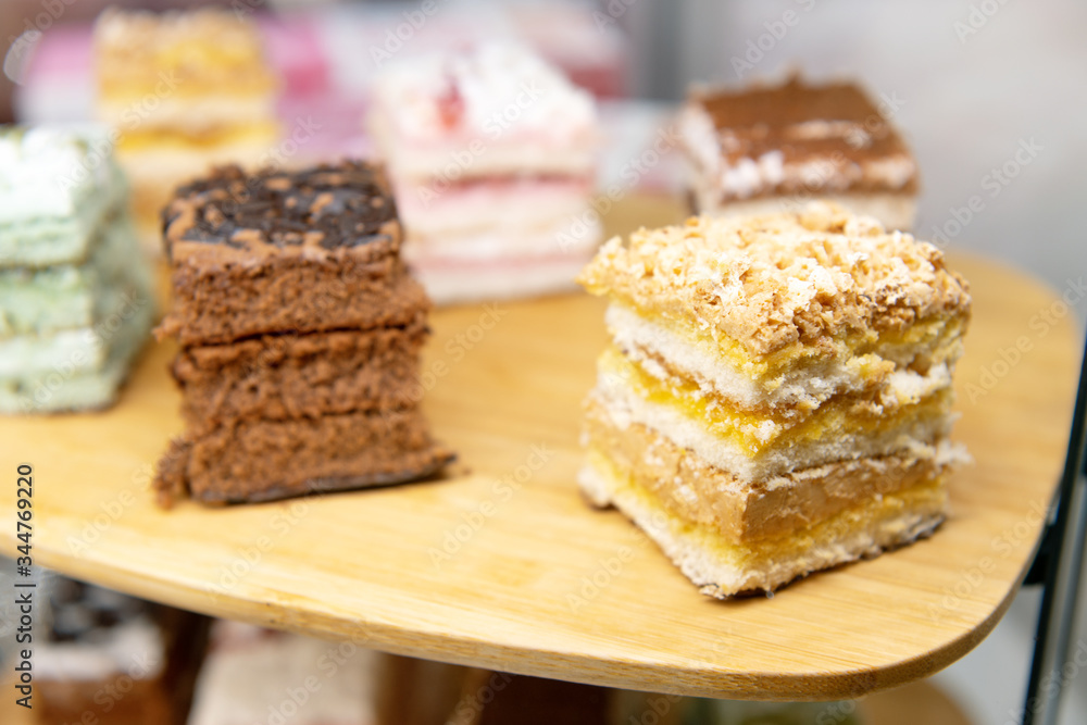 Sponge cakes on a wooden board. Sponge cakes on a wooden board.