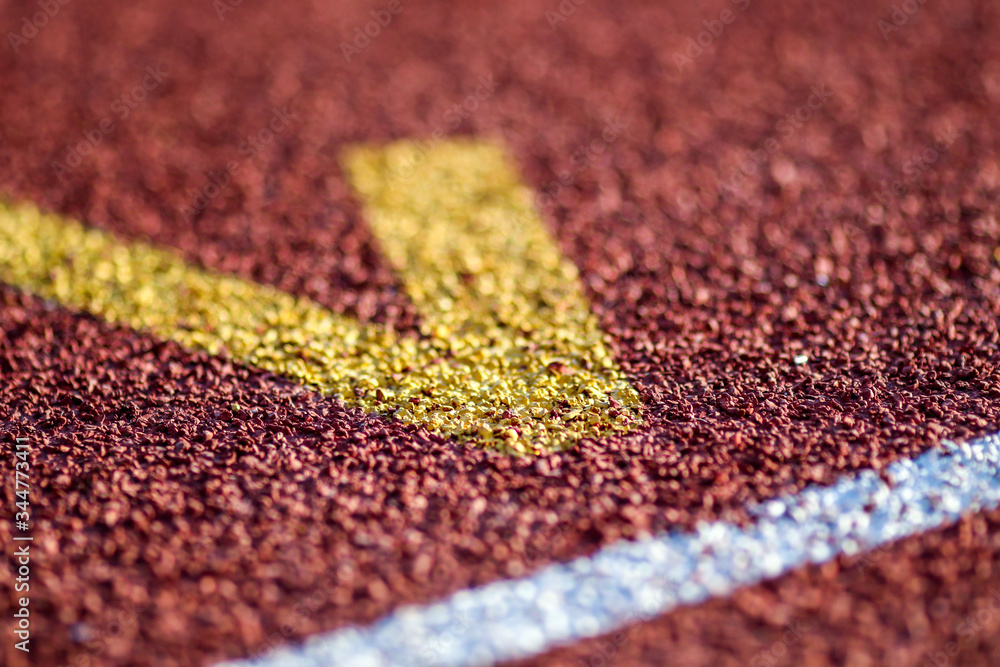 Fototapeta premium Red running sport track background and texture. Sport running track concept.
