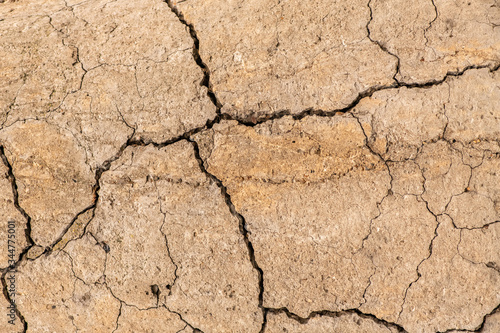 Abstract cement background. Cracked old concrete texture closeup.