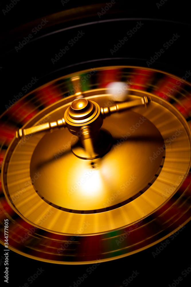 Spinning Roulette table close up at the Casino - Selective Focus Spinning Roulette table close up at the Casino - Selective Focus