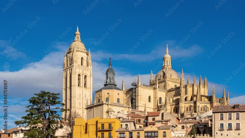 Time-lapse, clouds floating over Segovia Cathedral, dramatic clouds, Spain Time-lapse, clouds floating over Segovia Cathedral, dramatic clouds, Spain