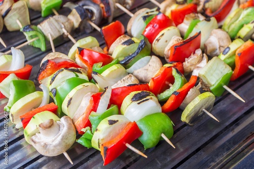 Vegetable skewers grilling on the barbecue