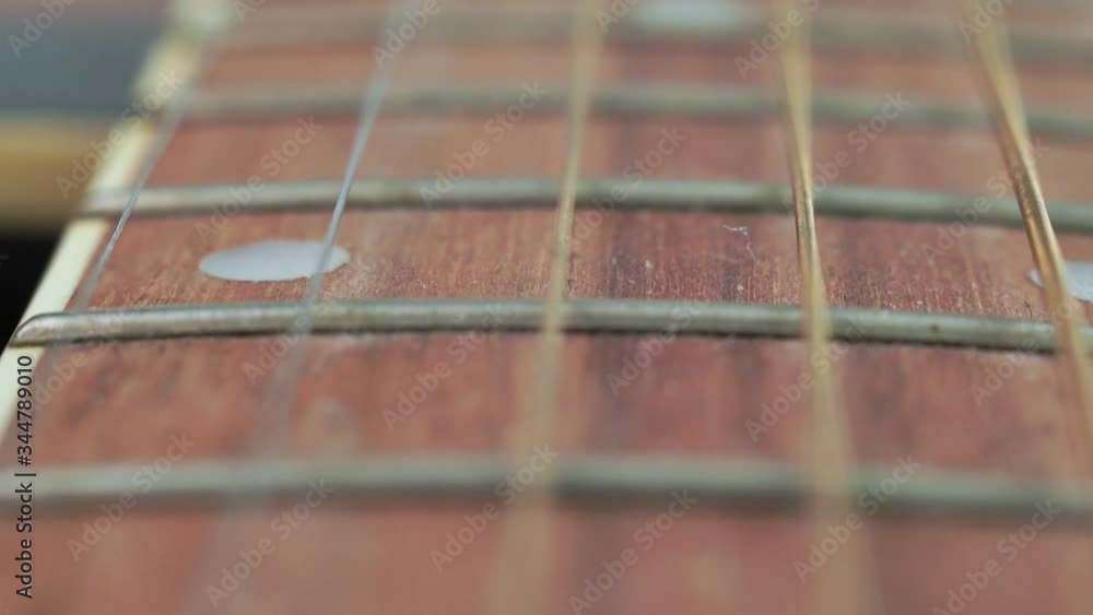 acoustic guitar strings close up macro selective focus acoustic guitar strings close up macro selective focus