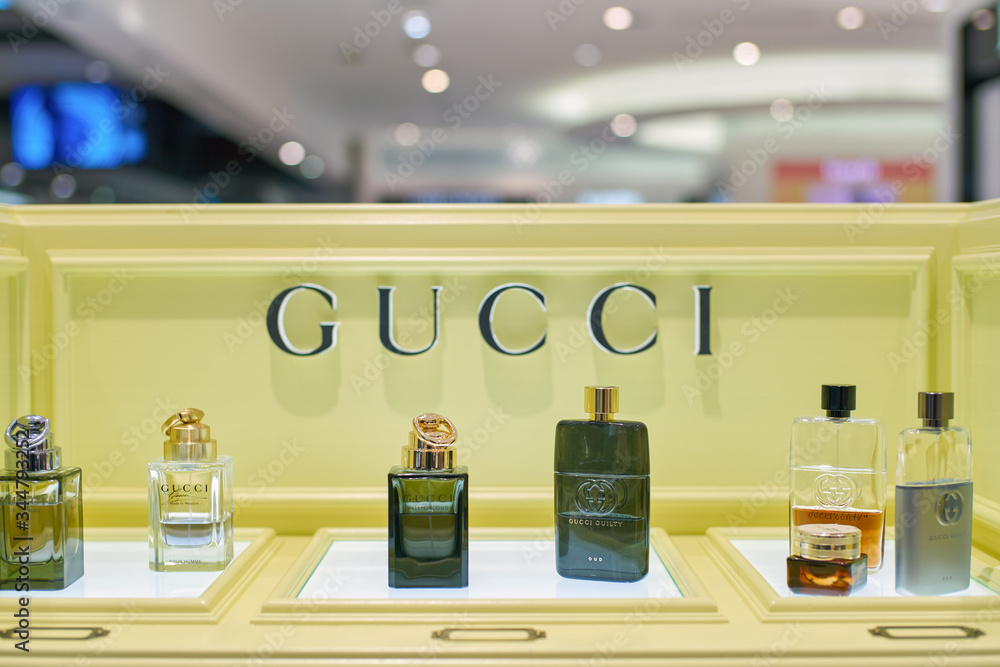 DUBAI, UAE - CIRCA FEBRUARY, 2019: close up shot of Gucci perfume bottles  in Duty Free at Dubai International Airport. Stock Photo | Adobe Stock