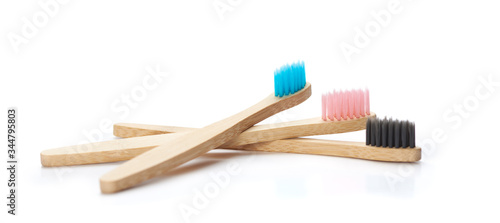 Toothbrush made of bamboo on white background