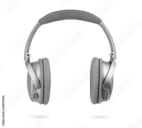 Fotografia modern silver wireless headphones isolated on white