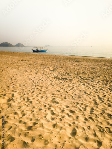 boat in the foggy sea photo