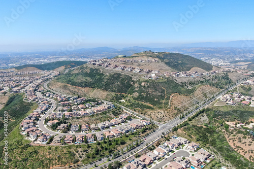 Aerial view of upper middle class neighborhood with big villas around Double Peak Park in San Marcos, California, USA.