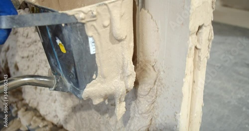 Wallpaper Mural Spraying of the plaster on the wall during the renovation, tools, 4k Torontodigital.ca