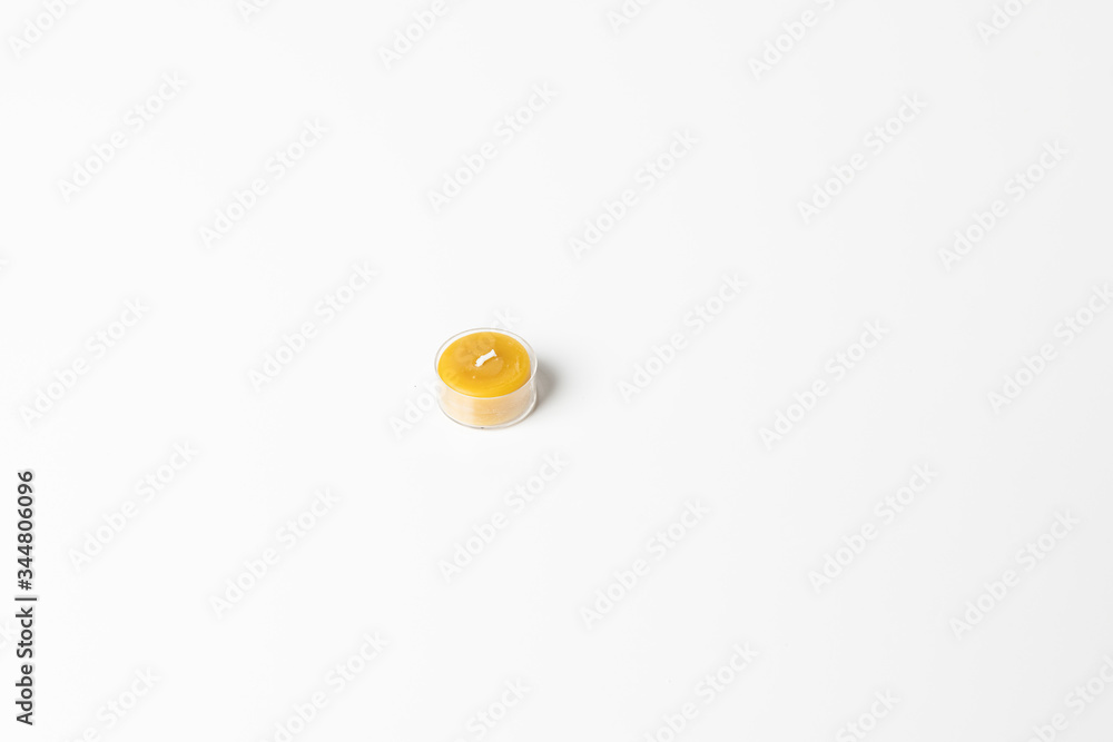 Small honey candle isolated on white background. Small honey candle isolated on white background.