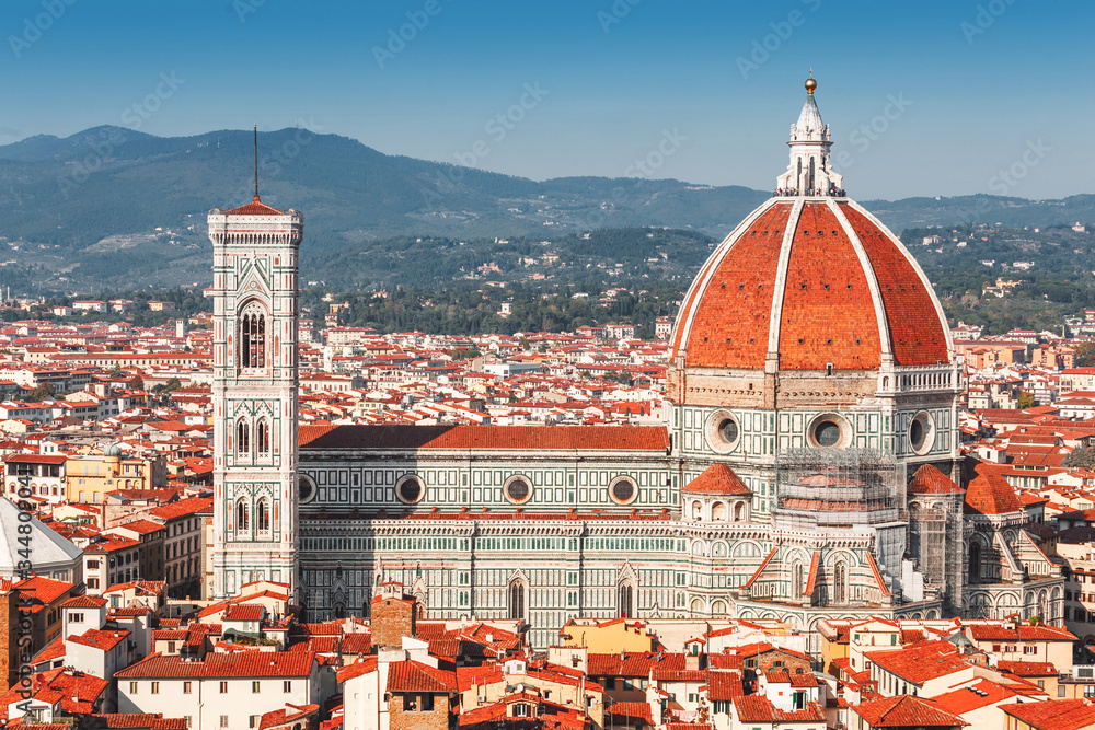 Santa Maria del Fiore is the main attraction and business card of Florence. Aerial view of the Cathedral and city roofs