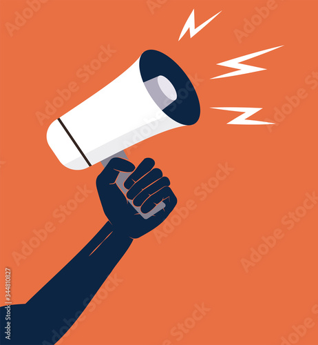 demonstration revolution protest raised arm fist holding a megaphone at a protest