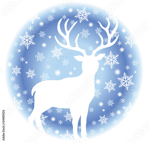 クリスマスのシンボル　丸い雪の背景とトナカイのシルエット