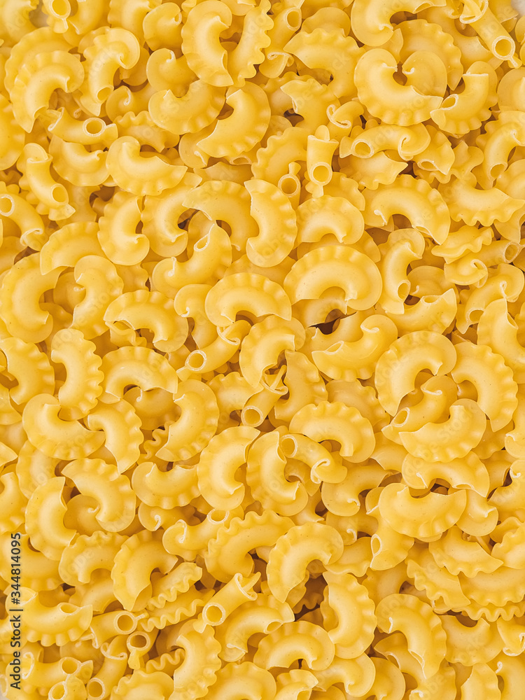 food background: raw pasta from durum wheat in the form of cockerels food background: raw pasta from durum wheat in the form of cockerels