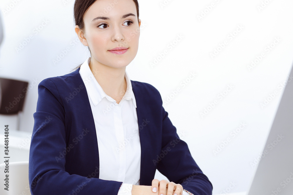 Businesswoman working with computer in office. Lawyer or accountant sitting at work, headshot. Business concept Businesswoman working with computer in office. Lawyer or accountant sitting at work, headshot. Business concept