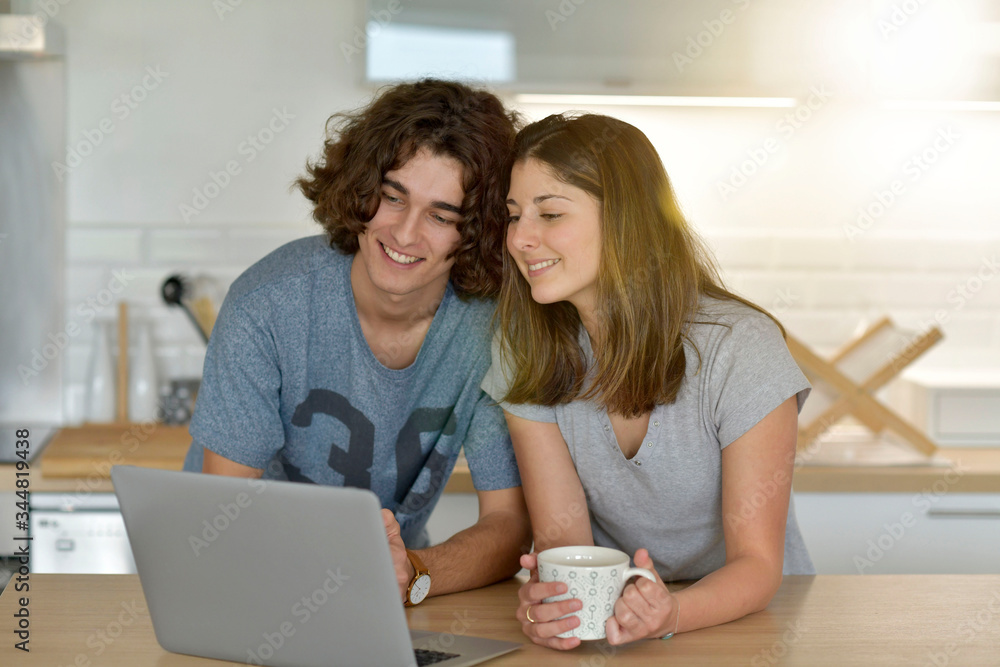 Young couple of students living together Young couple of students living together