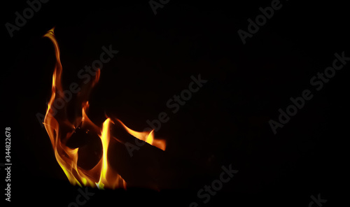 Fire on black background. Flame of a fireplace © Alona