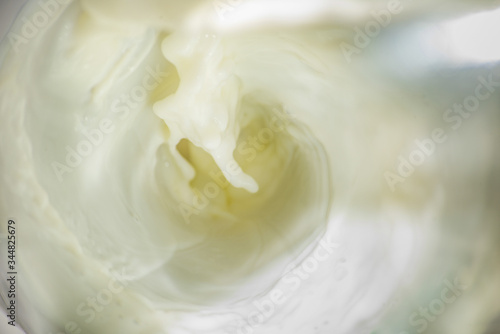 Funnel of dairy product from above, selective focus