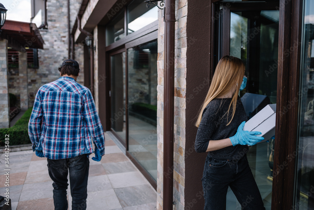 Delivery: Man Delivering Package To Homeowner