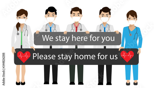 COVID-19 Quarantine lockdown country. Doctor team wearing face mask hold board "We stay here for you, please stay home for us",quarantine campaign to prevent spread of COVID-19 Corona virus outbreak.