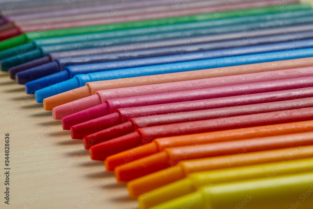 Colorful crayon on wooden table Colorful crayon on wooden table
