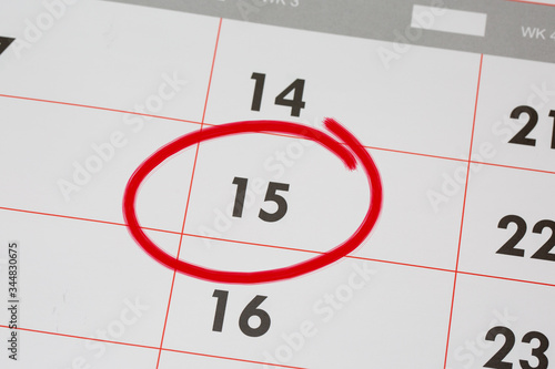 15th Date of the Month marked in red marker pen on a simple planner calendar