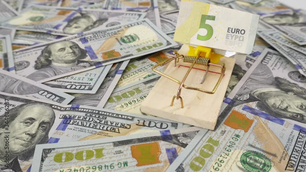 Banknote five euros in a mousetrap. Money is like bait. Cheating, fraud and easy money concept. Dollar background, blank mockup, place for text. Money is like bait. Banknote five euros in a mousetrap. Money is like bait. Cheating, fraud and easy money concept. Dollar background, blank mockup, place for text. Money is like bait.
