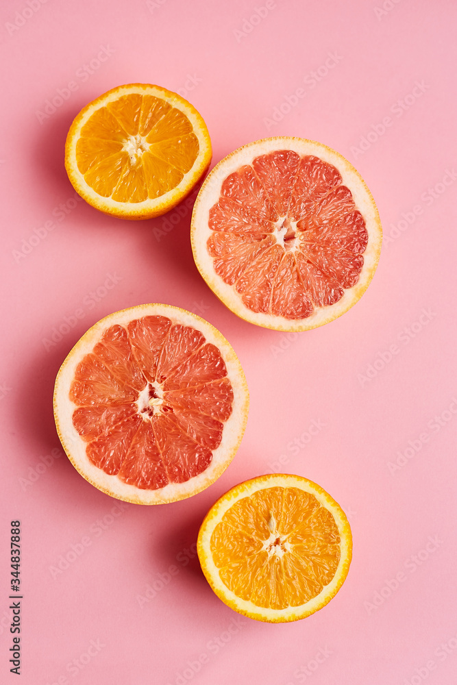 Slices of fresh orange and grapefruit on white background top view. Citrus Juice Concept, Vitamin C, Fruits. Creative summer background
Slices of fresh orange and grapefruit on white background top view. Citrus Juice Concept, Vitamin C, Fruits. Creative summer background
