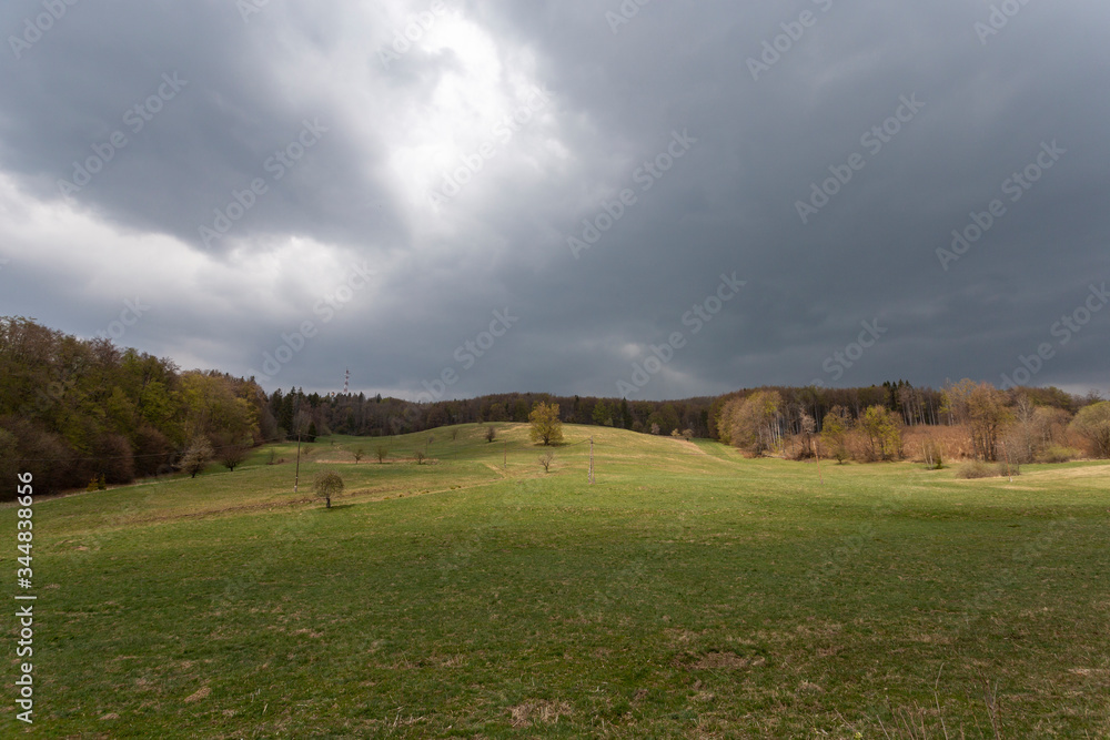 Cloudy sky over a meadow in the Bukk mountains