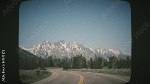 POV Driving through the Grand Teton National Park. VINTAGE FILM