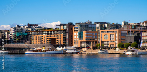 Oslo, Norway - Modern Aker Brygge borough of Oslo with yachts and piers at Oslofjord sea waterfront