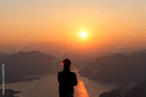 The tourist enjoy with landscape view of beautiful sunrise on big river and mountain view point