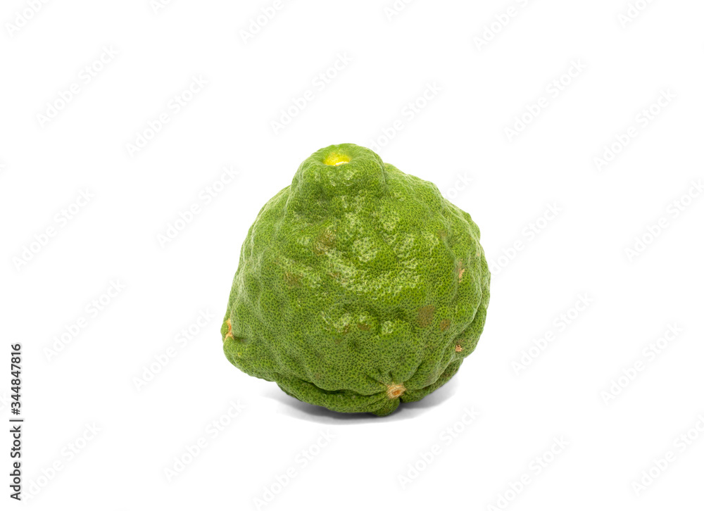 Green bergamot isolated with bruises on the skin Green bergamot isolated with bruises on the skin
