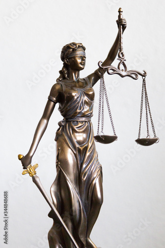 Bilde på lerret statue of Justitia with blindfold, sword and balance on white background