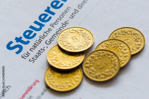 six golden coins on Swiss tax declaration form, Canton of Zurich photo