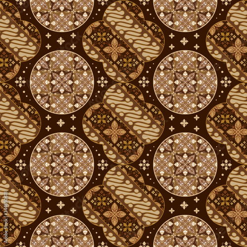 Art work of Javanese batik with beautiful motif and seamless dark brown color © City