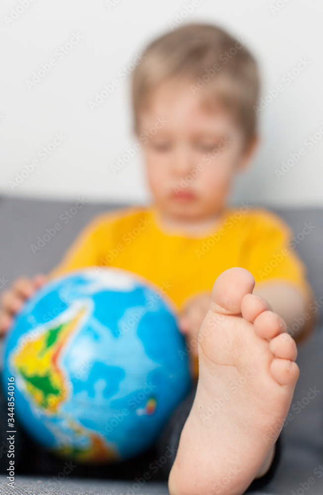 little boy, blond and planet earth, children - the future of the planet little boy, blond and planet earth, children - the future of the planet