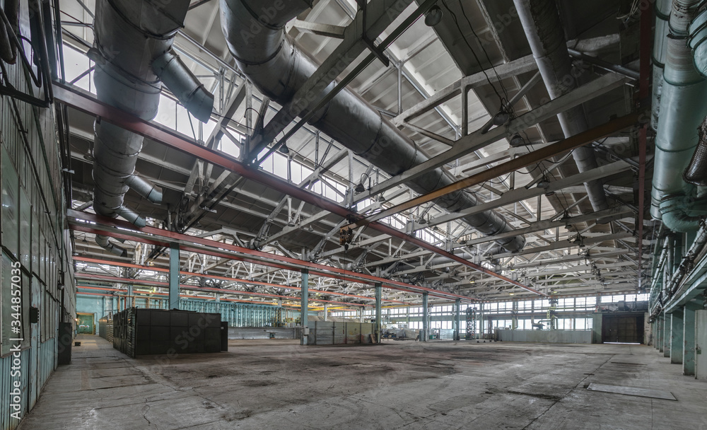 Fototapeta premium The interior of an empty production hall.