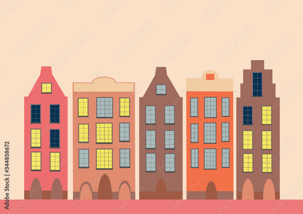 Multi-colored retro and vintage old-fashioned houses in a row in the evening