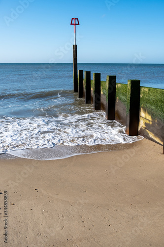 Waves hit the Groyne at Southbourne Beach photo