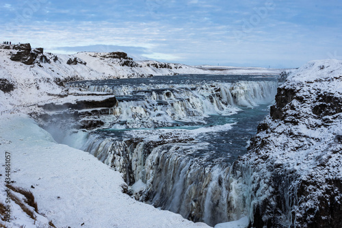 Gullfoss waterfall thundering into the river Hvita during winter in Iceland.